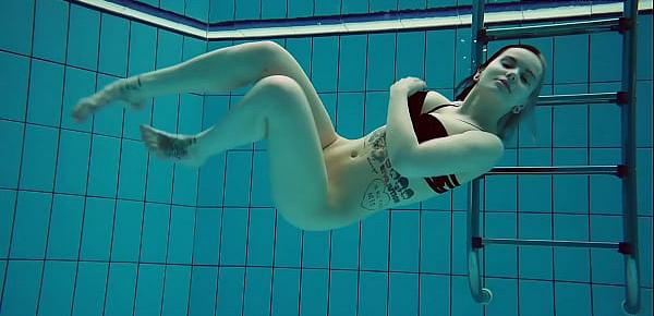  Big tits brunette babe Dashka swimming underwater